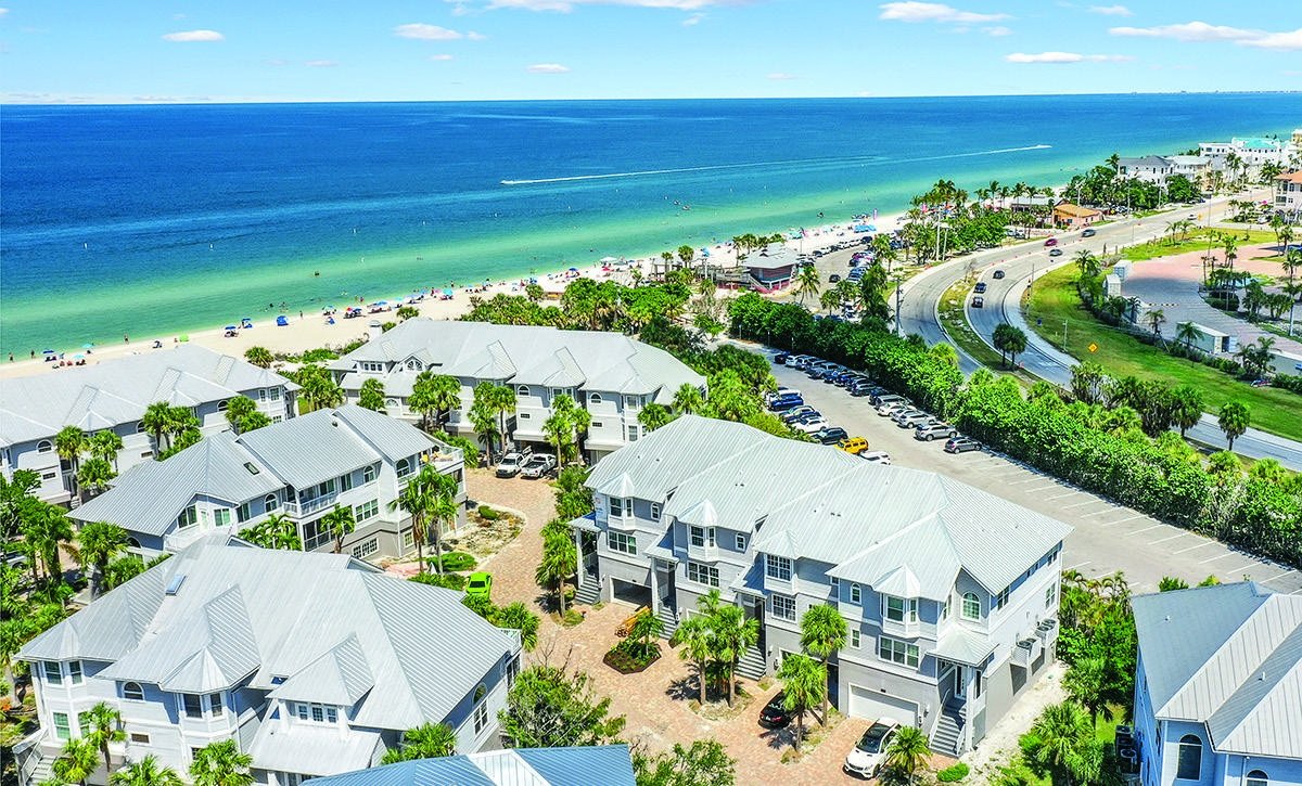 Gulf Coast shoreline and palm trees from above